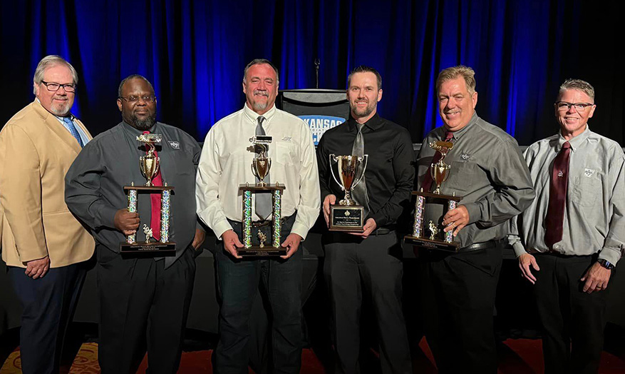 ABF TDC AR Team holding a trophy
